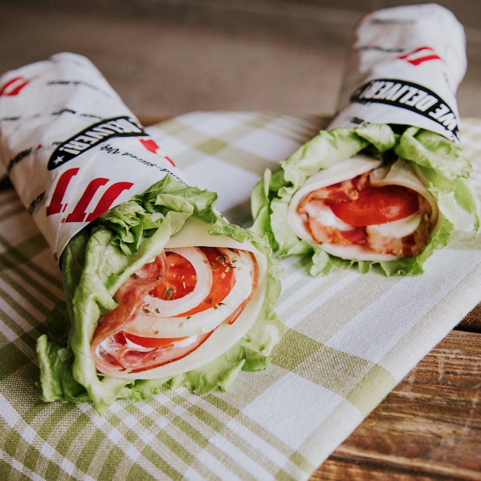 two wrapped lettuce wraps with visible ingredients