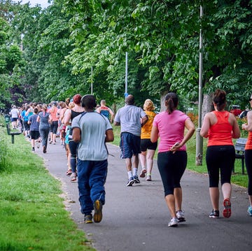 People running in a park This is an image