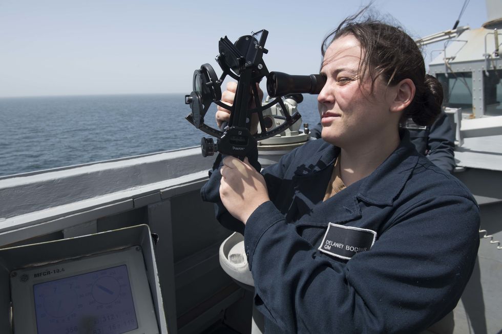 190320 n gc639 1009arabian gulf march 20, 2019  quartermaster seaman delaney bodine, from elkton, maryland, uses a sextant on the bridge wing while standing watch as the boatswain’s mate of the watch bmow aboard the guided missile destroyer uss spruance ddg 111 in the arabian gulf, march 20, 2019 the spruance is deployed to the us 5th fleet area of operations in support of naval operations to ensure maritime stability and security in the central region, connecting the mediterranean and the pacific through the western indian ocean and three strategic choke points us navy photo by mass communication specialist 1st class ryan d mclearnonreleased