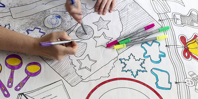 Uncommon Goods Is Selling A Washable Christmas Cookie Coloring Tablecloth For Kids