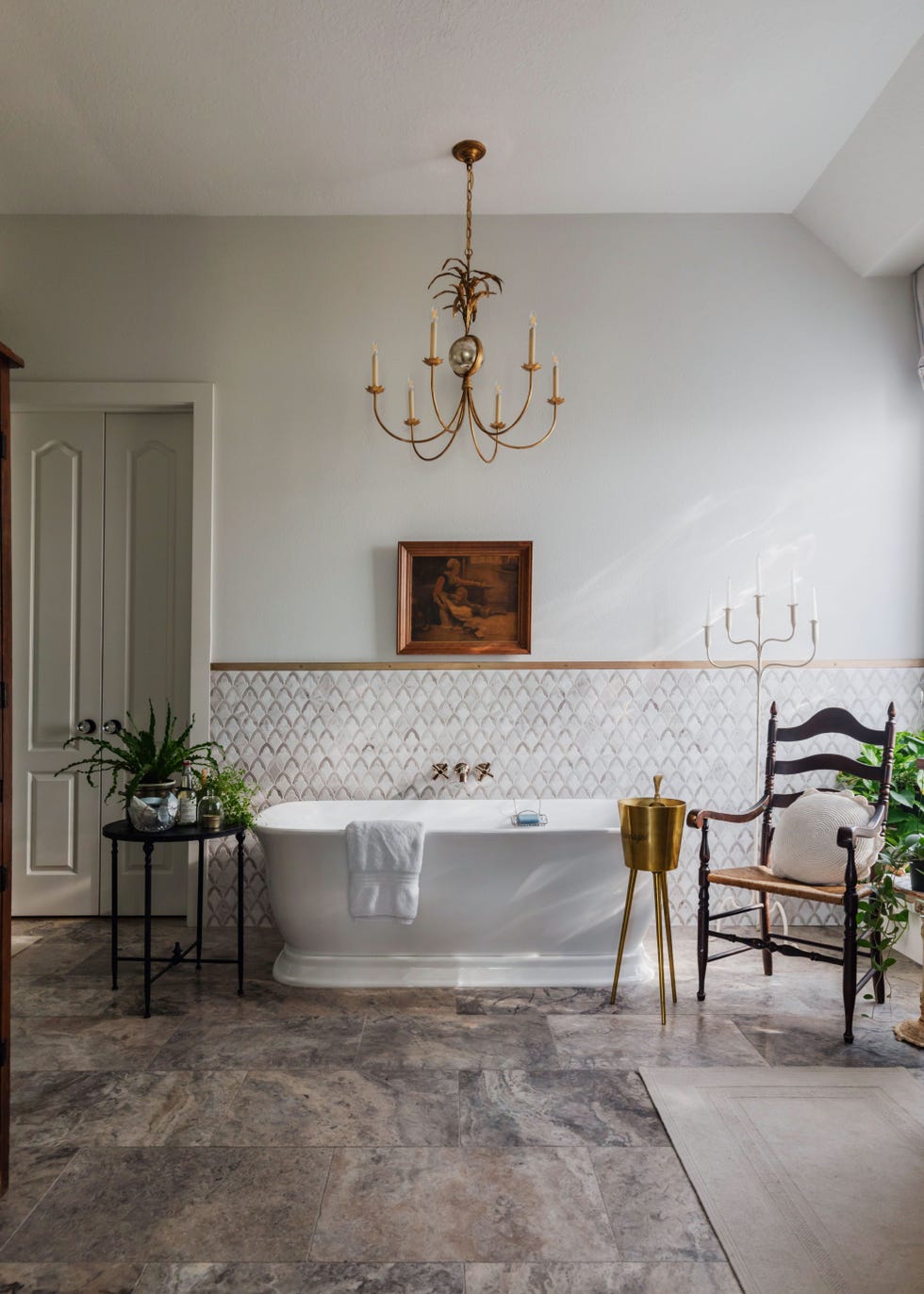 bathroom, bathtub, stone floors, tile walls