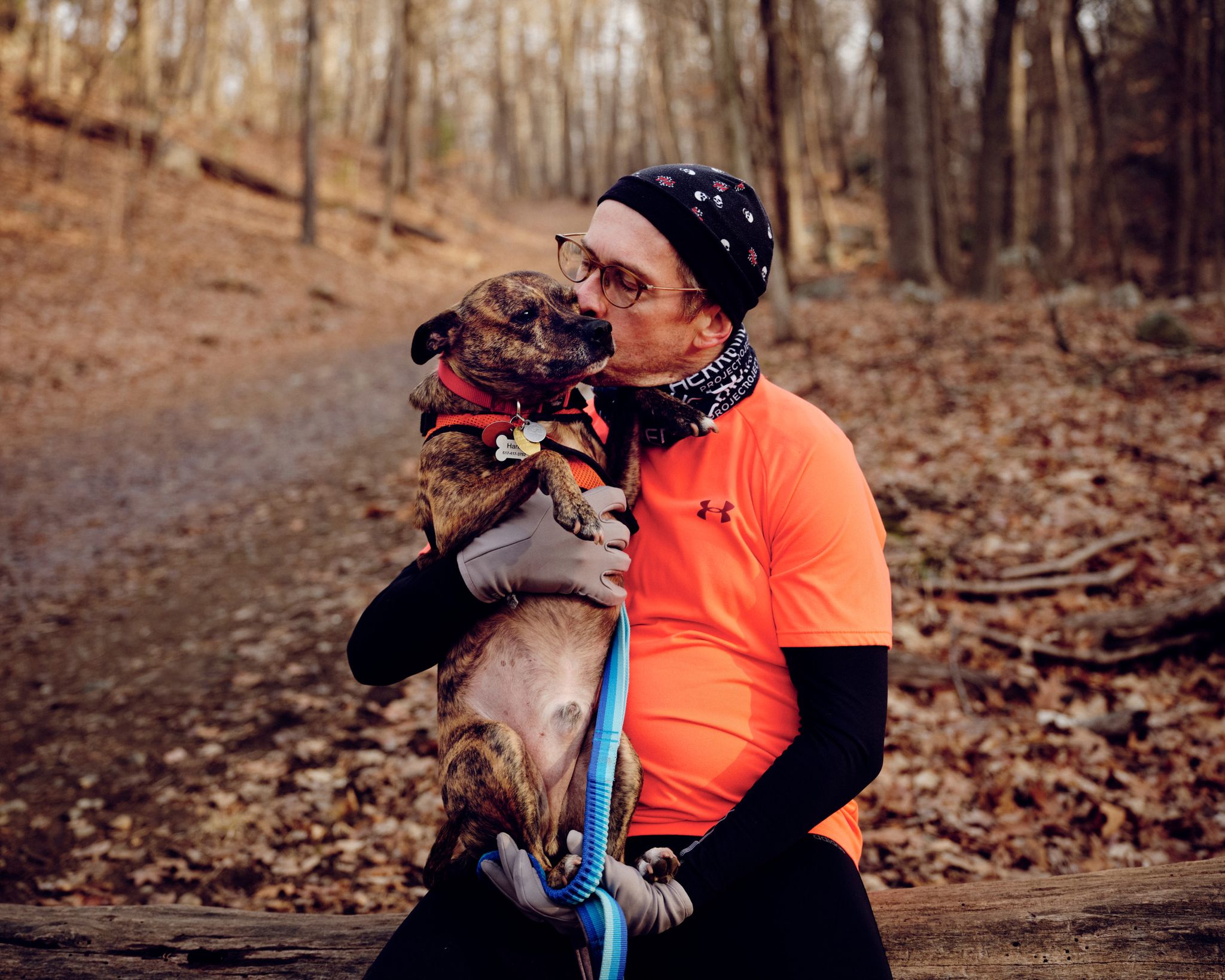 author and writer caleb daniloff and his dog, hank at the middlesex fells reservation outside of boston ma