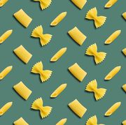 pasta pattern on a green background top view