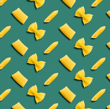 pasta pattern on a green background top view