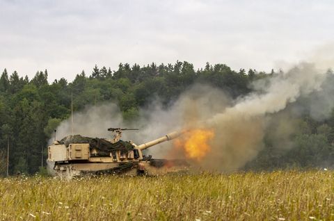 an army paladin m109a7 artillery system belonging to delta battery, 1st battalion, 5th field artillery regiment, 1st armored brigade combat team, 1st infantry division, fires rounds during a live fire exercise on a range at grafenwoehr training area, germany, aug 6, 2019 the 1 5 fa is participating in combined resolve xii, a multinational exercise designed to increase the readiness of allied forces during atlantic resolve us army photo by sgt jeremiah woods