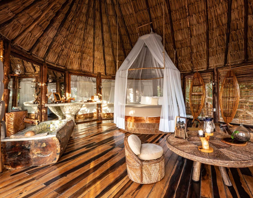 ecofriendly interior of a rustic hut featuring natural materials