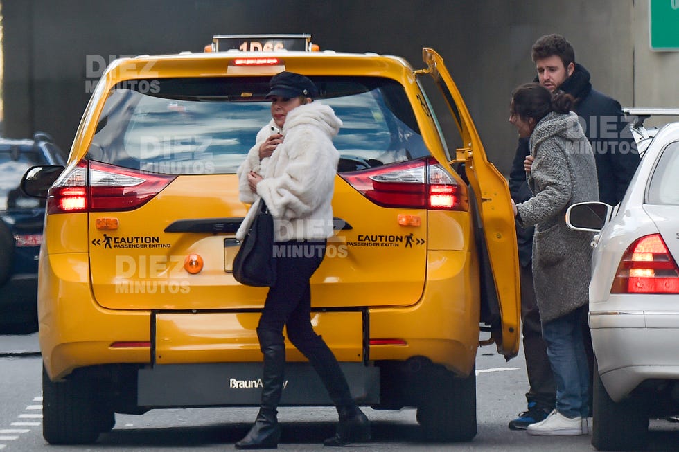 Vehicle, Motor vehicle, Car, Yellow, Mode of transport, Transport, Taxi, Vehicle door, Traffic, Fashion, 