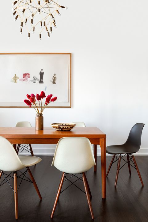 dining room, wooden table, black and white chairs
