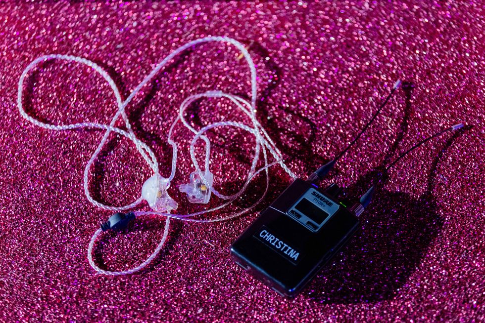 a mic pack on a glitter background