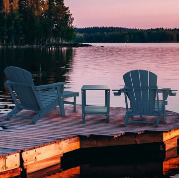 two chairs on a dock