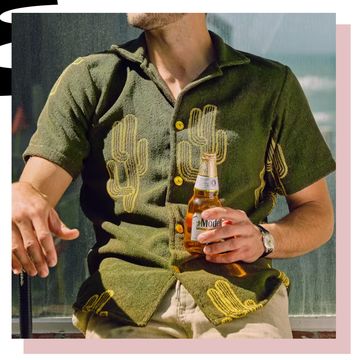 a man holding a bottle