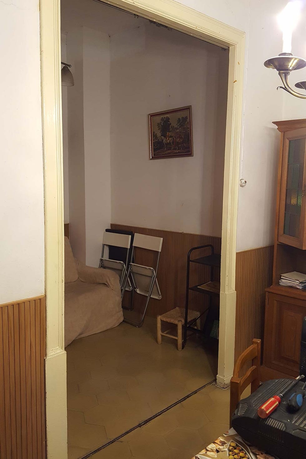 Piso reformado en Barcelona: ANTES: Salón y comedor.