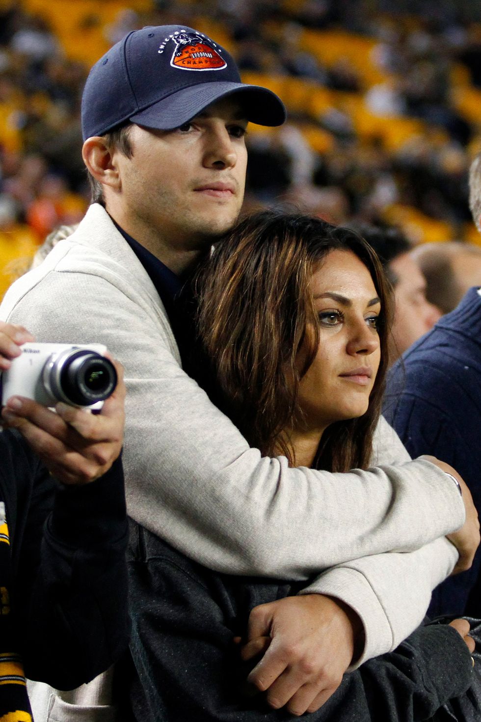 pittsburgh, pa   september 22  ashton kutcher and mila kunis look on from the sidelines before the game between the chicago bears and the pittsburgh steelers on september 22, 2013 at heinz field in pittsburgh, pennsylvania  photo by justin k allergetty images