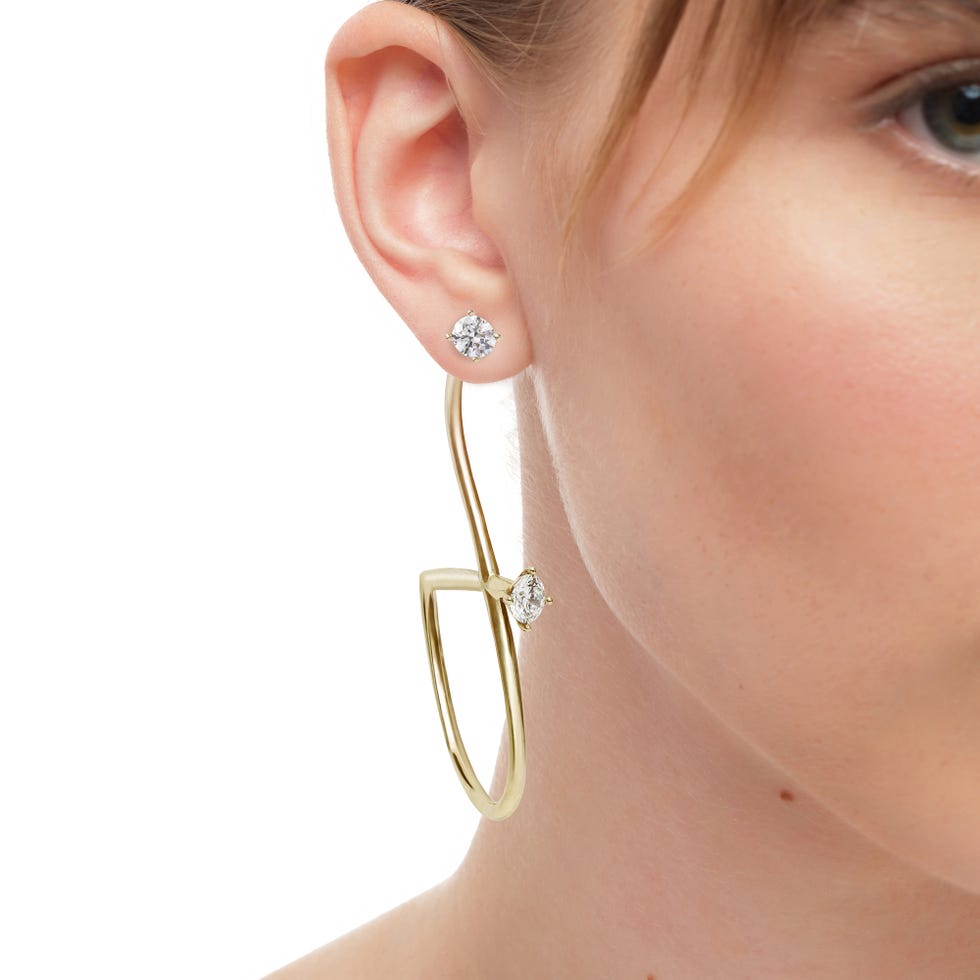 stylish earrings featured on a model