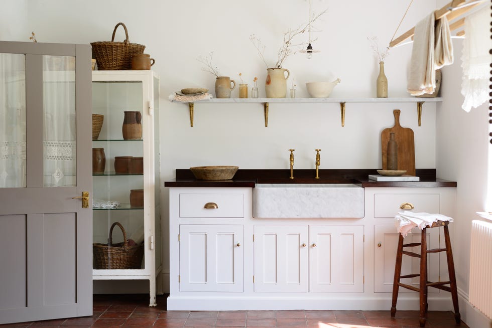 galley kitchen with white shaker style cabinets