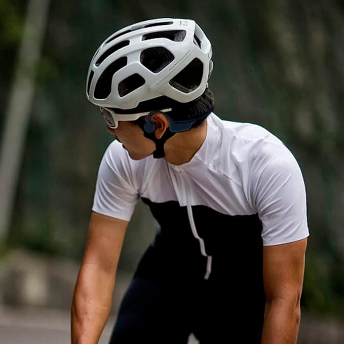 cyclist wearing a helmet and athletic gear