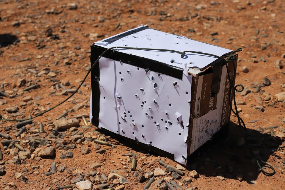 a bullet ridden box used as a target during a smart shooter sighting device familiarization range near at tanf garrison, syria, may 30, 2020 coalition and partner forces regularly train on various weapon systems in a joint effort to help set conditions for the enduring defeat of daesh in syria us army photo by staff sgt william howard