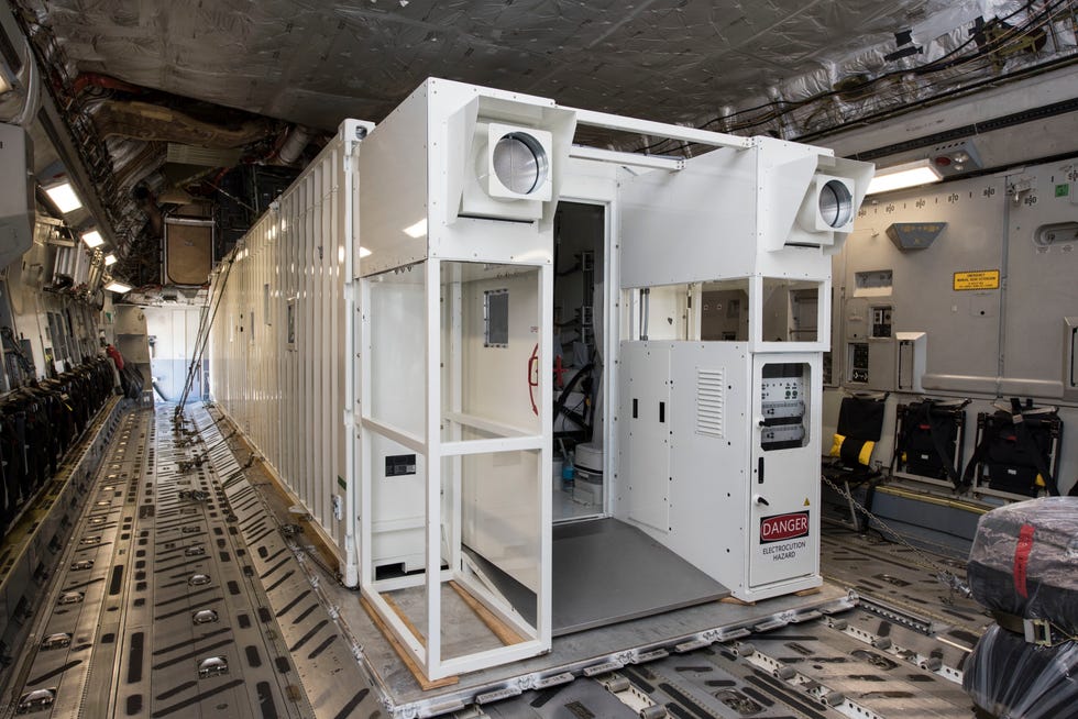a negatively pressured conex sits on a us air force c 17 globemaster iii aircraft at ramstein air base, germany, june 24, 2020 the npc is the latest isolated containment chamber developed to transport covid 19 patients, replacing the existing transport isolation system the npc is an infectious disease containment unit designed to minimize contamination risk to aircrew and medical attendants, while allowing in flight medical care for patients afflicted by diseases like covid 19 us air force photo by senior airman milton hamilton