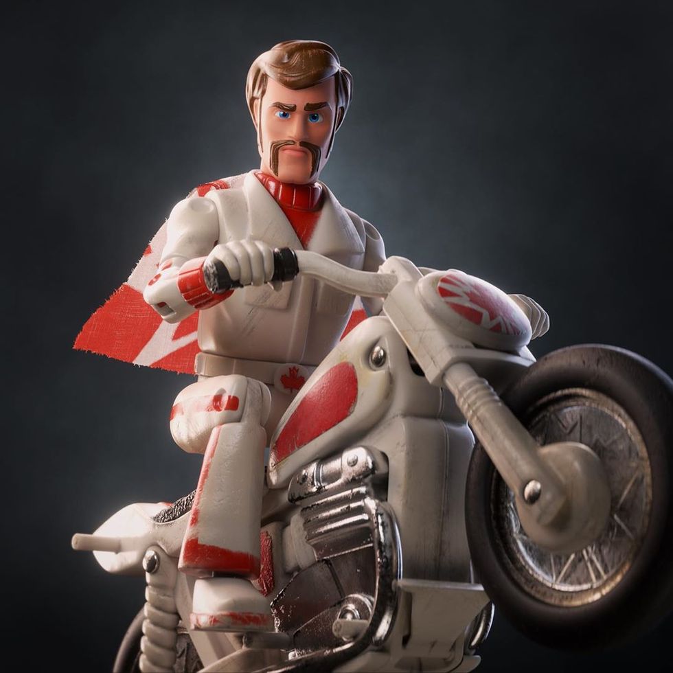 Figurine, Action figure, Toy, Motorcycle, Vehicle, Fencing, Fictional character, 