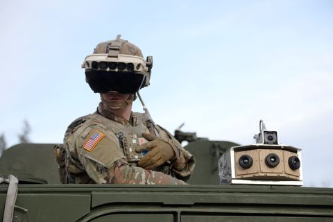 soldier dons the integrated visual augmentation system capability set 3 hardware while mounted on a stryker in joint base lewis mccord, wa
