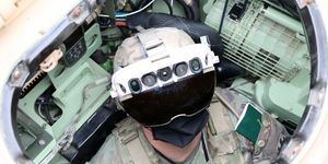 soldier dons the integrated visual augmentation system capability set 3 hardware while mounted on a bradley in joint base lewis mccord, wa