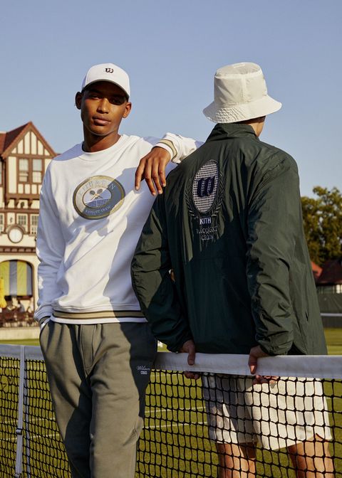 two men in green kith tenniswear