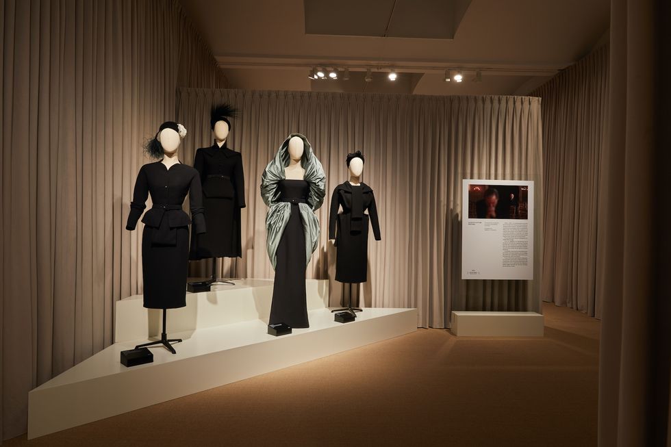 a group of mannequins in black and white