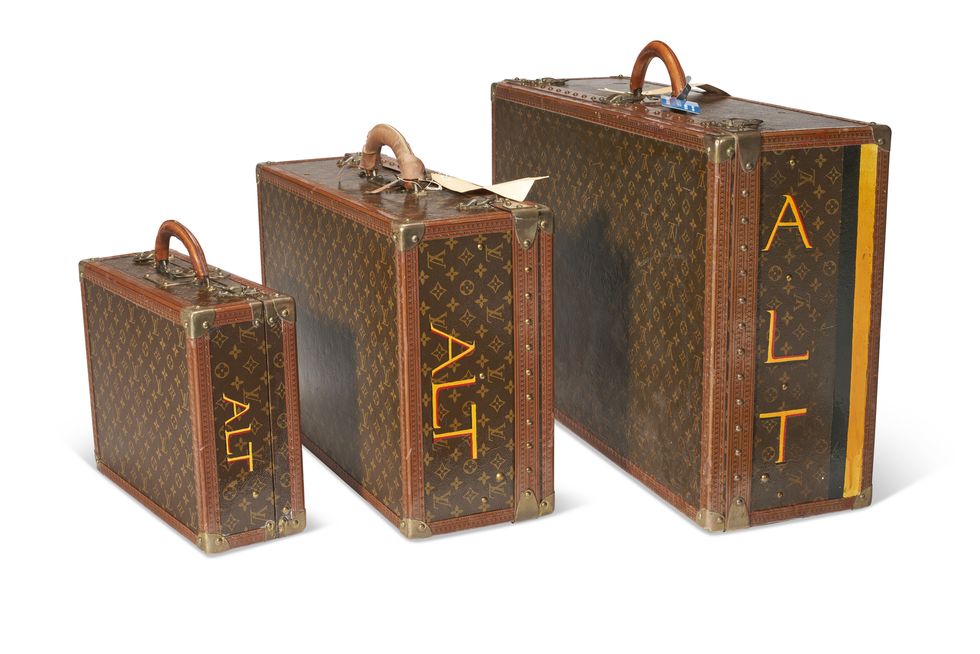 a ﻿set of three personalized brown monogrammed trunks complete with andre leon talleys initials a part of the sale of his estate with christies auction house