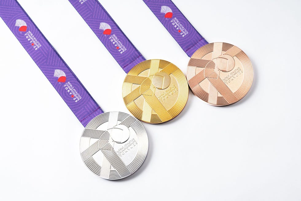 three medals representing first second and third place in a sporting event