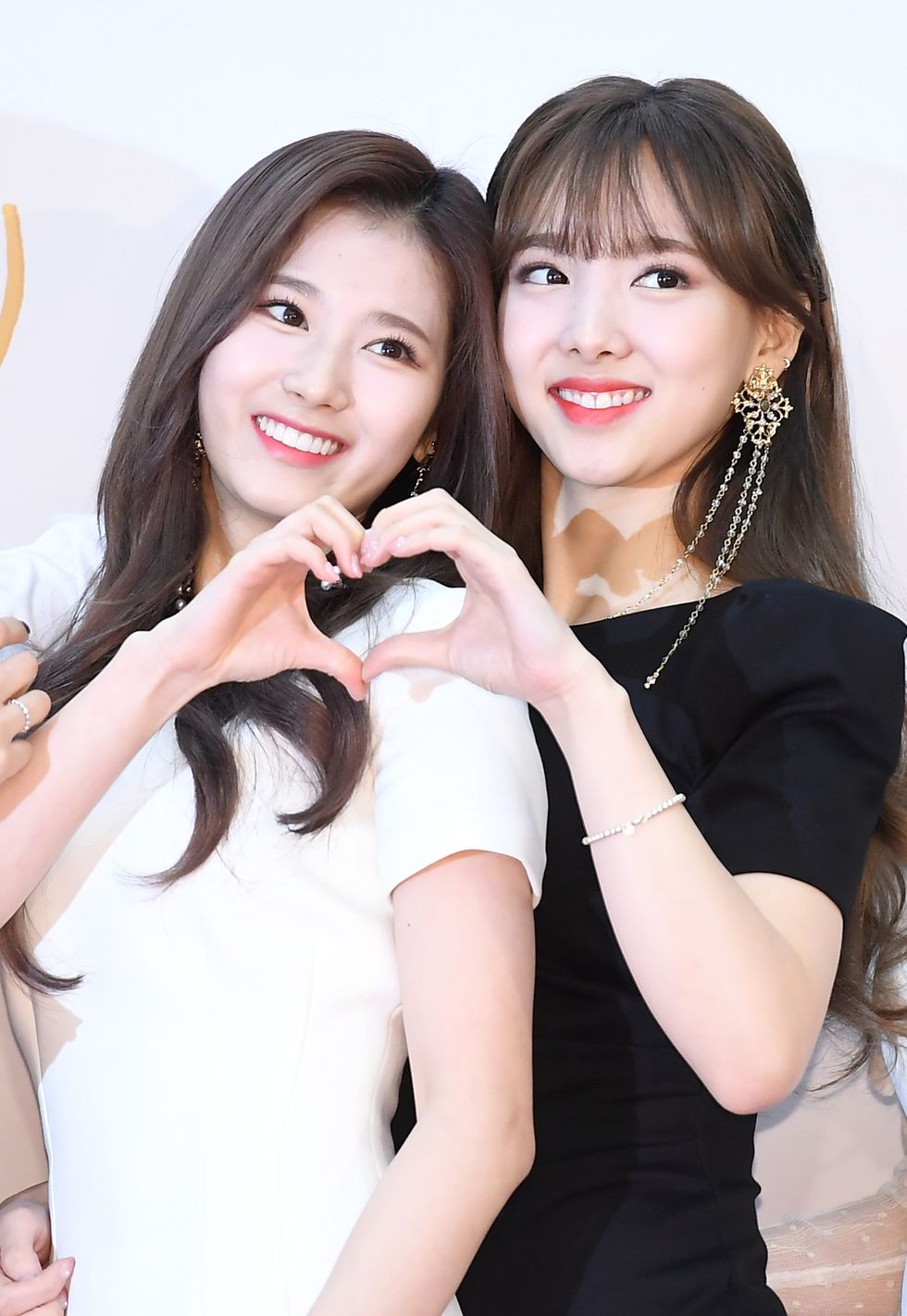 sana, nayeon of twice attends the red carpet event of 32nd golden disc awards at kintex on january 11th in gyeonggi province, south koreaphotoosen