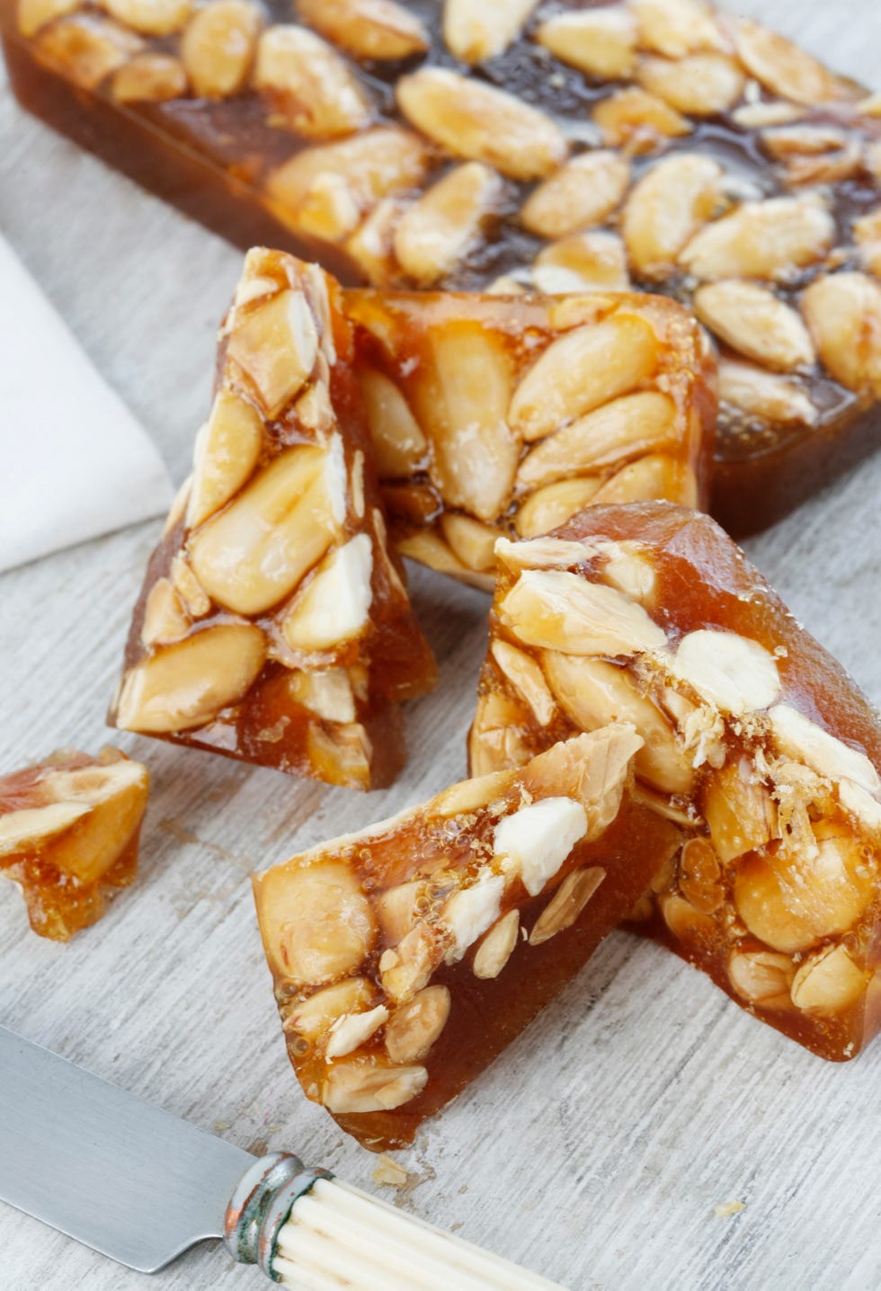 nutbased confectionery with a shiny surface and visible nut pieces