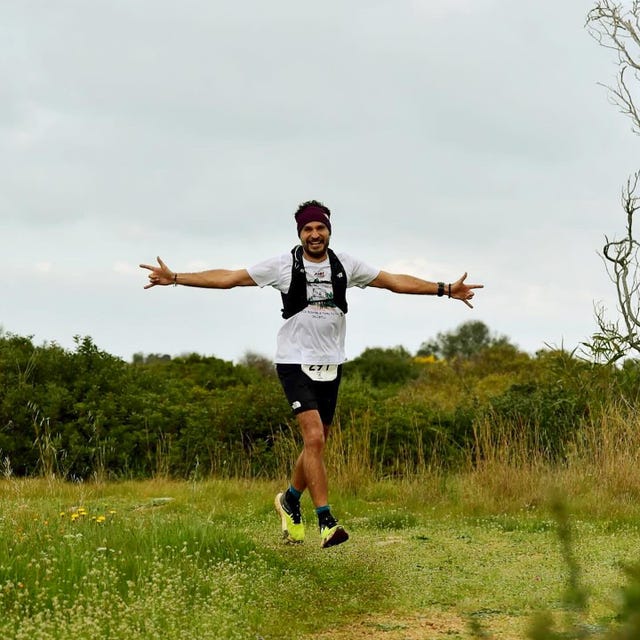 a man running in a field