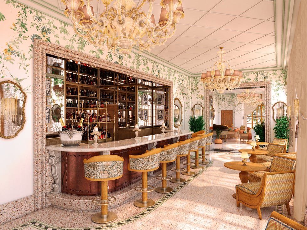 elegant bar interior with ornate decor and seating.