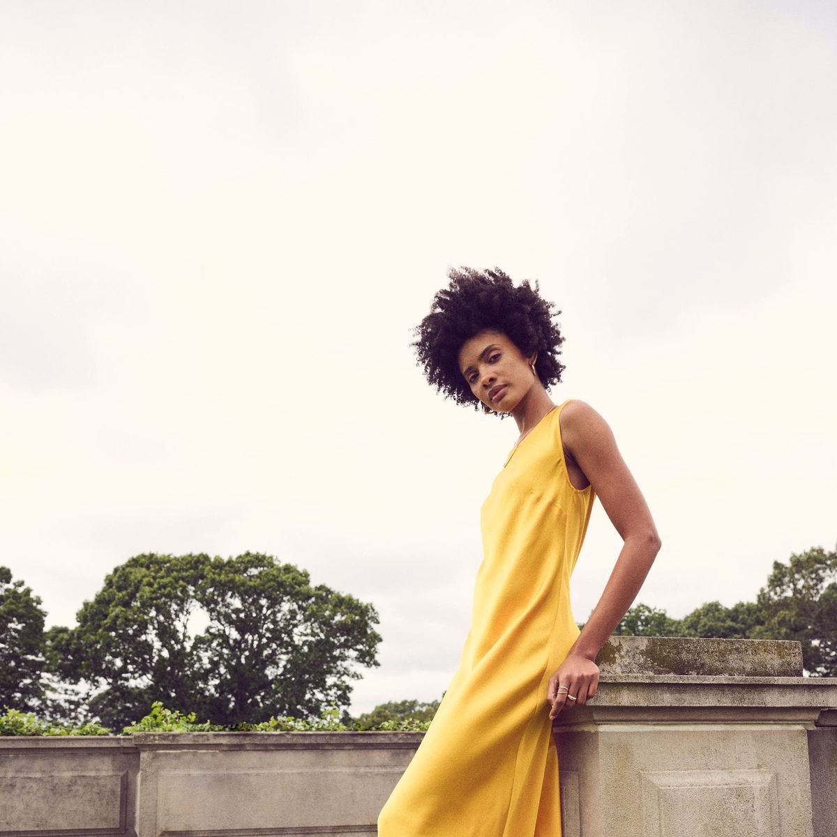a person in a yellow dress