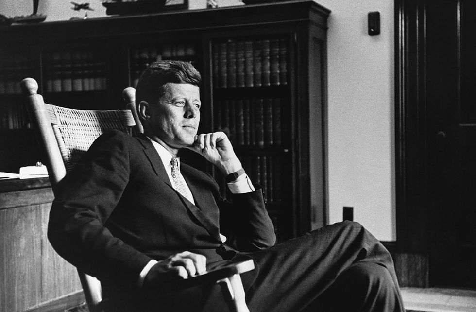 John F. Kennedy Seated in rocking Chair
