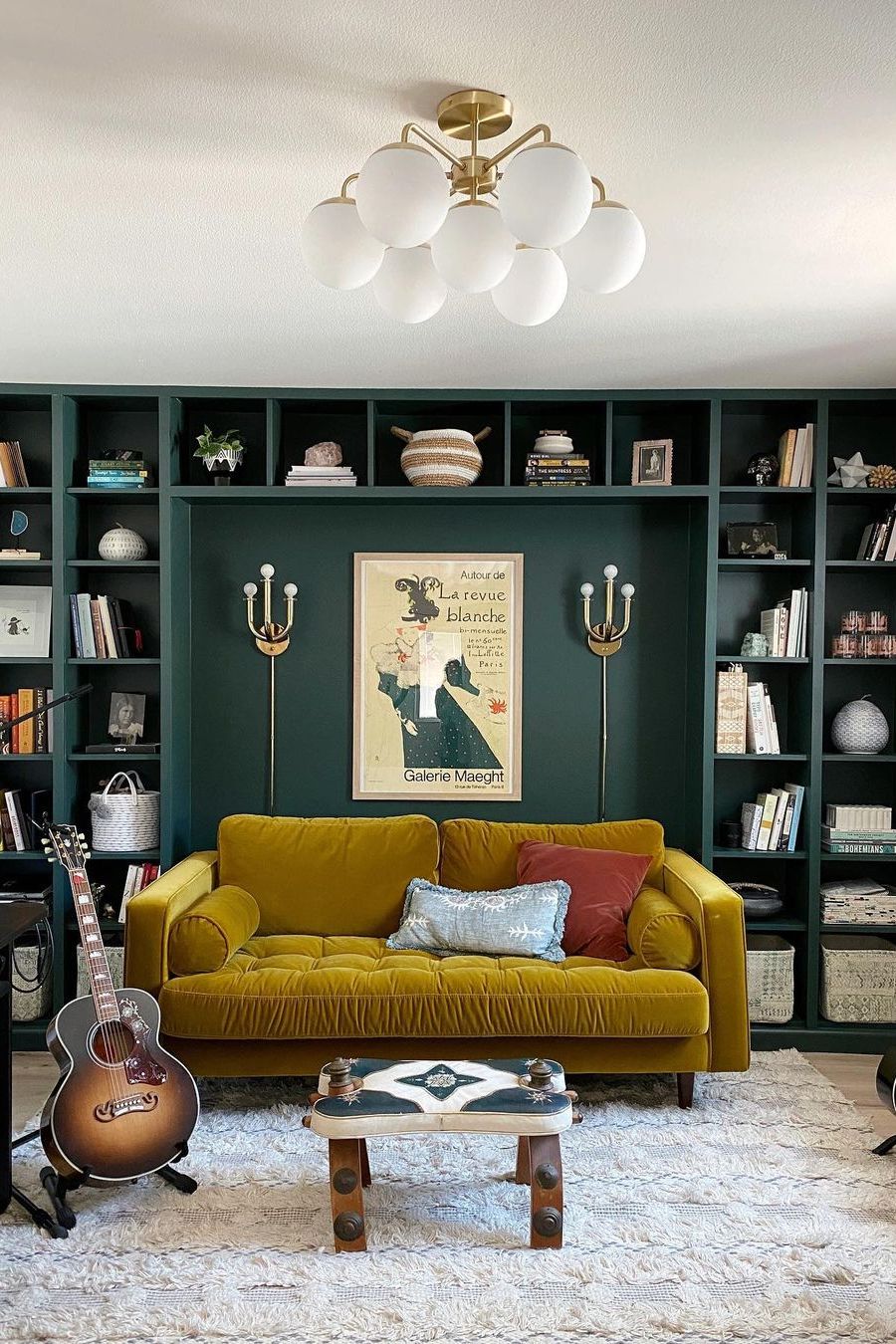 Room with sofa and shelves with books
