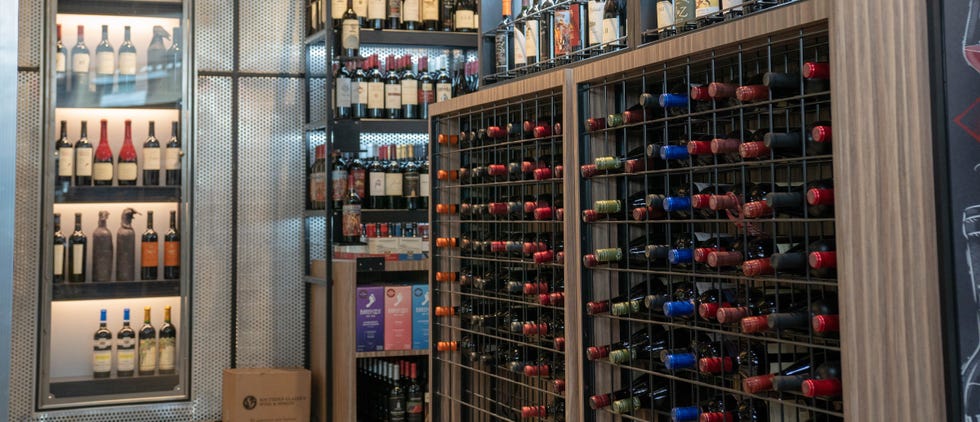 Furniture, Shelf, Liquor store, Alcohol, Building, Inventory, Wine rack, Distilled beverage, Shelving, Collection, 