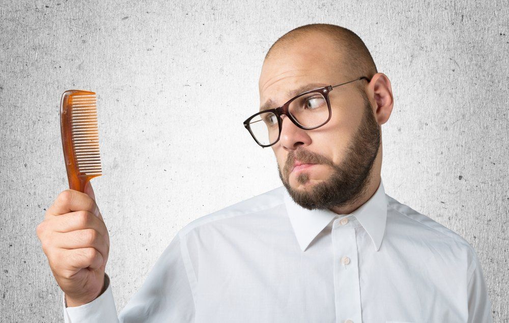 How to Not Be 'The Hat Guy' of Hair Loss