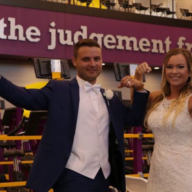 couple gets married at Planet Fitness 