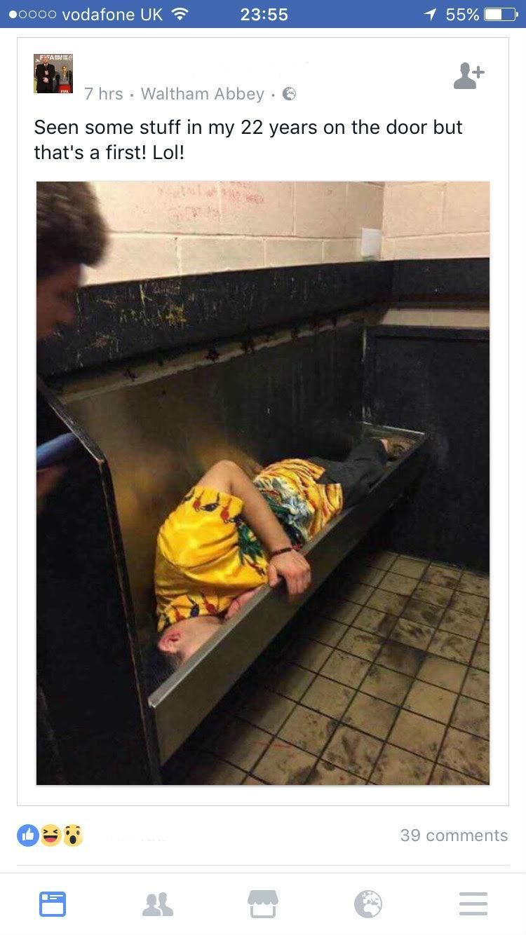 drunk man  in urinal