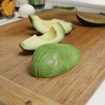 slicing an avocado