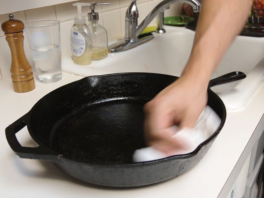 Cleaning my cast iron. Dry it off with paper towel and it turns black while  my pan turns grey? : r/castiron