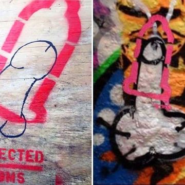 graffiti penis covered with condoms