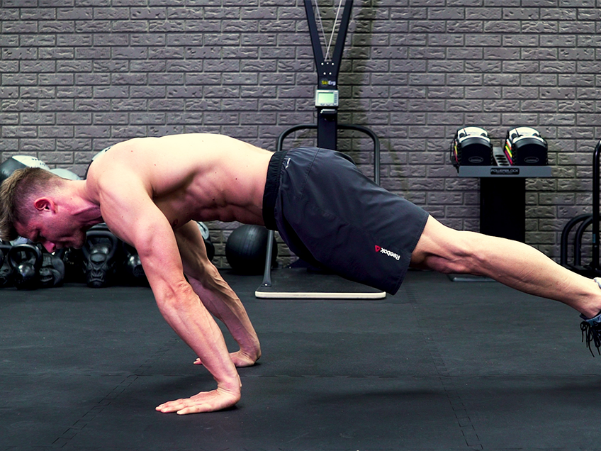 The Planche Rock to Pushup Will Carve Up Some Superhuman Abs
