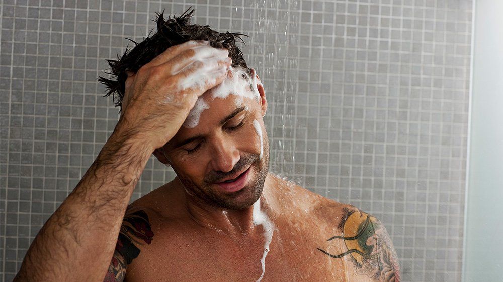 Why Your Hair Gets Greasy and What to Do About It | Men's Health