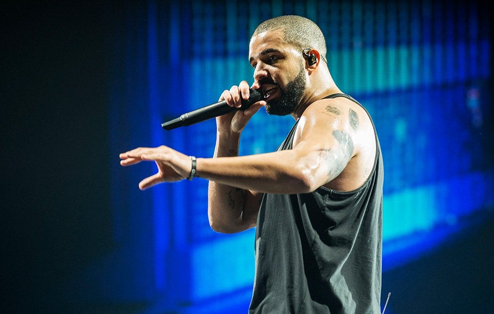 Drake Reps Houston With New “H” Star Tattoo on His Shoulder- PopStarTats