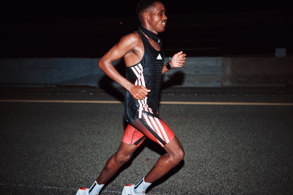 professional runners running at night