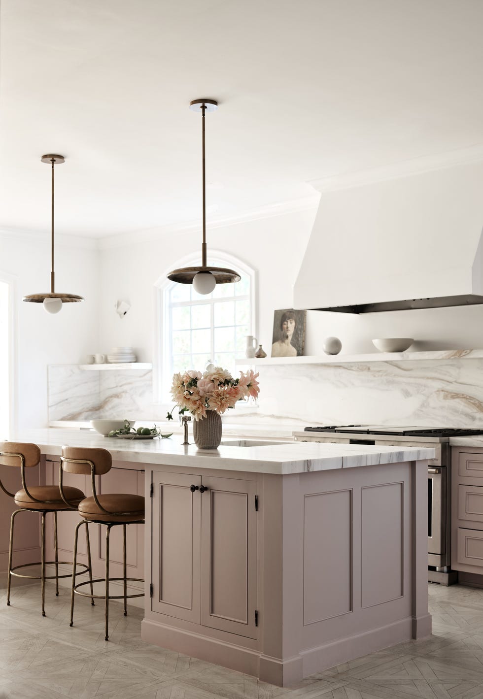 Modern kitchen with a central island and stylish decor.