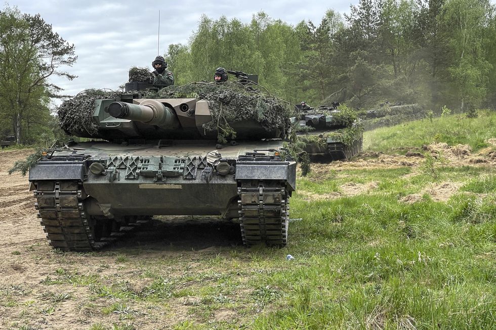 polish army leopard 2a tanks stage for a multinational force on force exercise as part of defender europe at drawsko pomorskie, poland, may 14, 2022 defender europe 22 is a series of us army europe and africa multinational training exercises taking place in eastern europe the exercise demonstrates us army europe and africa’s ability to conduct large scale ground combat operations across multiple theaters in support of nato us army photo by capt tobias cukale
