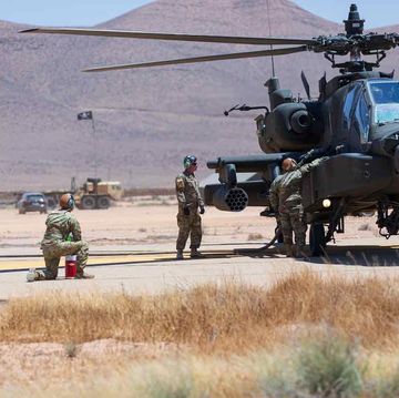 utah national guard soldiers of the 1st attack reconnaissance battalion, 211th aviation regiment, utah army national guard fuel an ah 64d apache helicopter in guelmim, morocco, june 27, 2022, as part of exercise african lion the 2022 training exercise marks the first time apache helicopters have flown, supported, and fired rounds in morocco african lion 2022 is us africa command's largest, premier, joint, annual exercise hosted by morocco, ghana, senegal and tunisia, june 6 30 more than 7,500 participants from 28 nations and nato train together with a focus on enhancing readiness for us and partner nation forces al22 is a joint all domain, multi component, and multinational exercise, employing a full array of mission capabilities with the goal to strengthen interoperability among participants and set the theater for strategic access